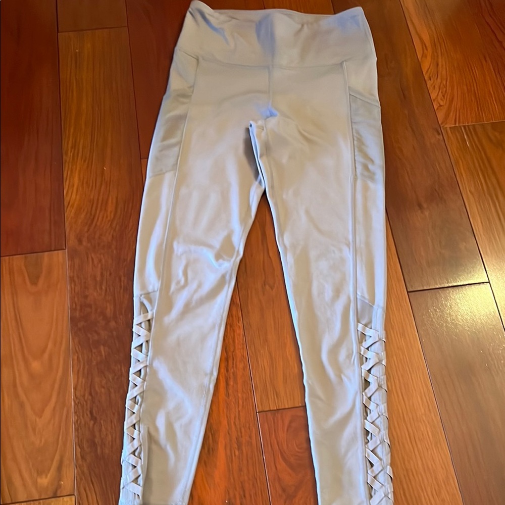 Fashion Nova tan colored Leggings with Side Lattice.